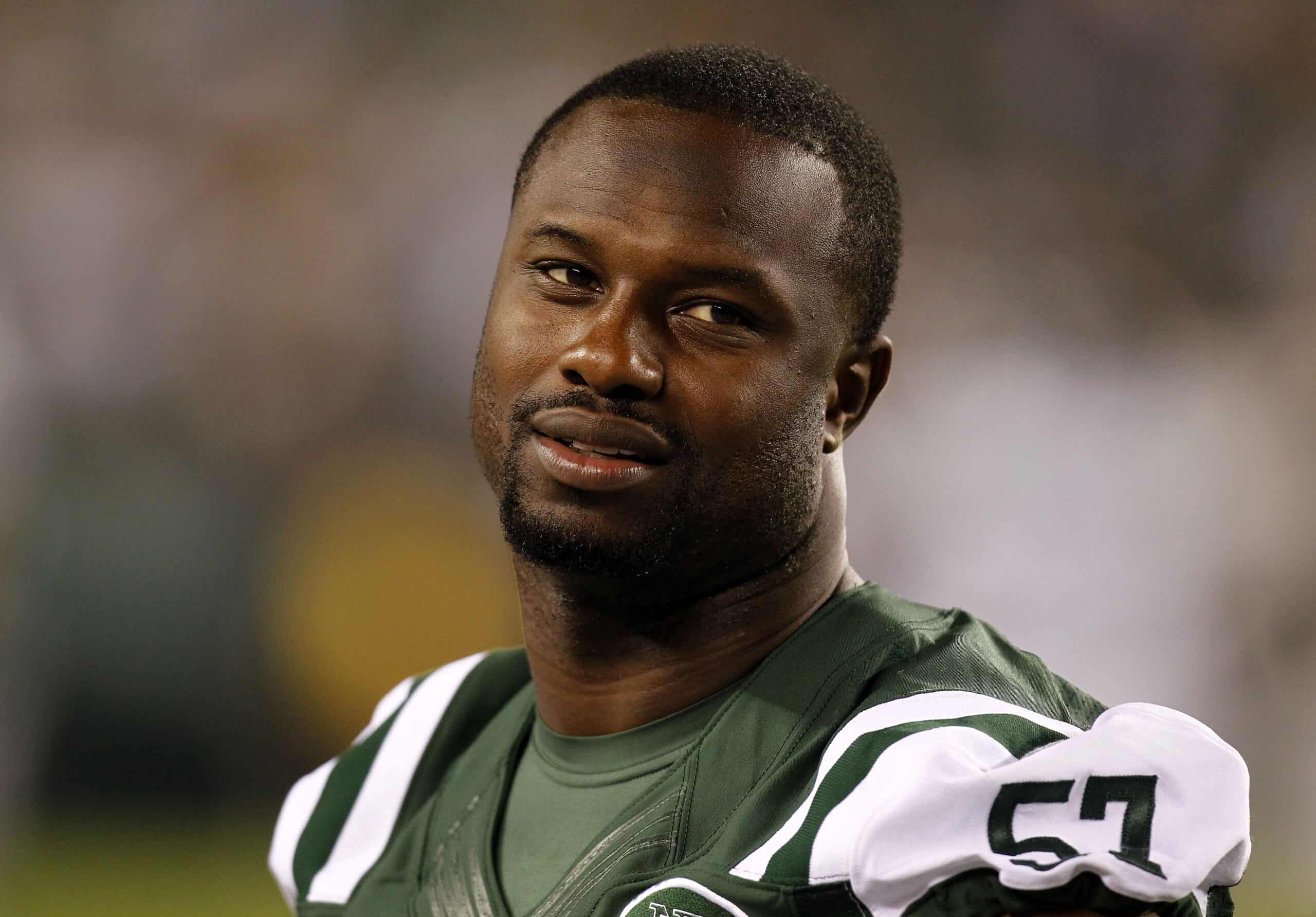 Bart Scott #57 of the New York Jets stands on the sidelines during a preseason game against the New York Jets at Lincoln Financial Field on August 30, 2012 in Philadelphia, Pennsylvania.