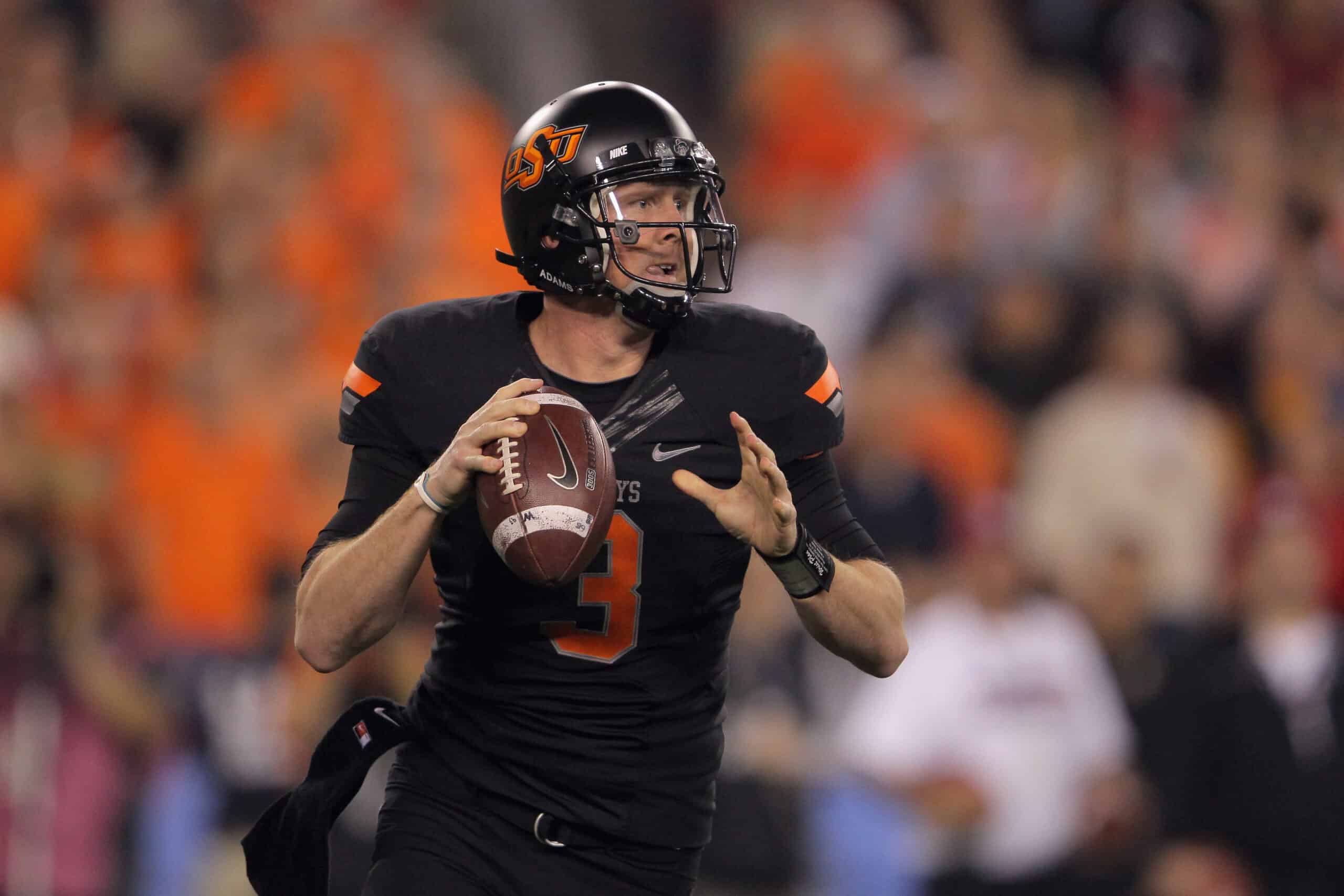 Brandon Weeden #3 of the Oklahoma State Cowboys throws a pass against the Stanford Cardinal during the Tostitos Fiesta Bowl on January 2, 2012 at University of Phoenix Stadium in Glendale, Arizona. Oklahoma State won 41-38 in overtime. 