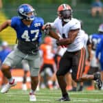 Anthony Walker #4 of the Cleveland Browns covers Nakie Griffin-Stewart #47 of the New York Giants during a joint practice on August 19, 2021 in Berea, Ohio.