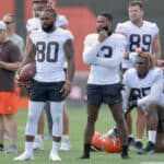 Wide receiver Jarvis Landry #80 and wide receiver Odell Beckham Jr. #13 of the Cleveland Browns watch from the sidelines during Cleveland Browns Training Camp on July 30, 2021 in Berea, Ohio.