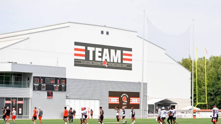 Cleveland Browns players walk off the field after the second day of Cleveland Browns Training Camp on July 29, 2021 in Berea, Ohio.