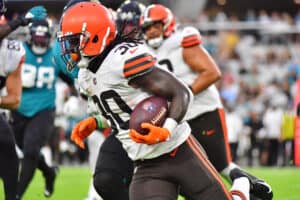 D'Ernest Johnson #30 of the Cleveland Browns runs with the ball in the first quarter against the Jacksonville Jaguars during a preseason game at TIAA Bank Field on August 14, 2021 in Jacksonville, Florida.