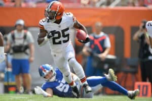 Running back Demetric Felton #25 of the Cleveland Browns returns the opening kick-off during the first quarter against the New York Giants at FirstEnergy Stadium on August 22, 2021 in Cleveland, Ohio.