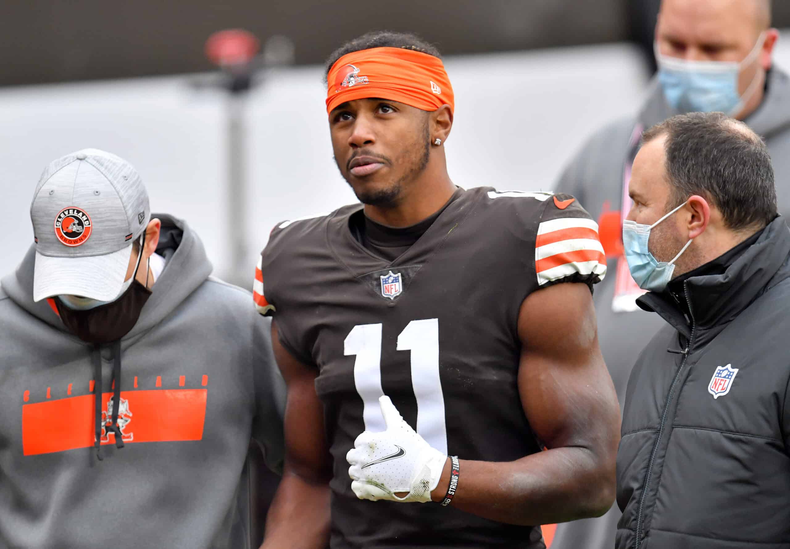 Donovan Peoples-Jones #11 of the Cleveland Browns is tended to by medical staff after sustaining a hard hit against the Pittsburgh Steelers in the second quarter at FirstEnergy Stadium on January 03, 2021 in Cleveland, Ohio.