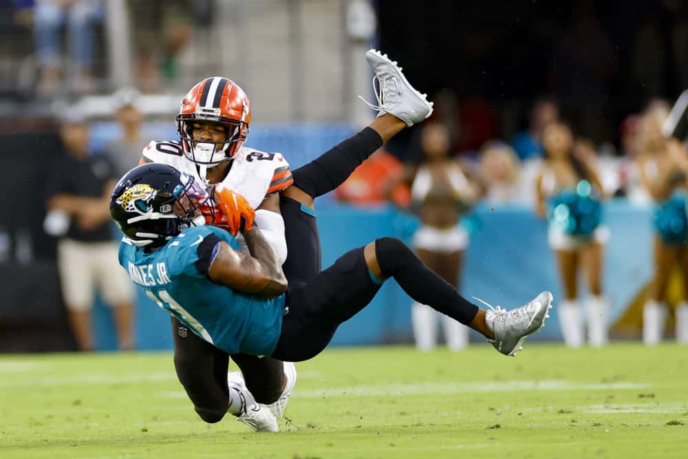 Jacksonville Jaguars Wide Receiver Marvin Jones Jr. (11) makes a catch whole defended by Cleveland Browns Cornerback Greg Newsome II (20) during the preseason game between the Cleveland Browns and the Jacksonville Jaguars on August 14, 2021 at TIAA Bank Field in Jacksonville, Fl. 