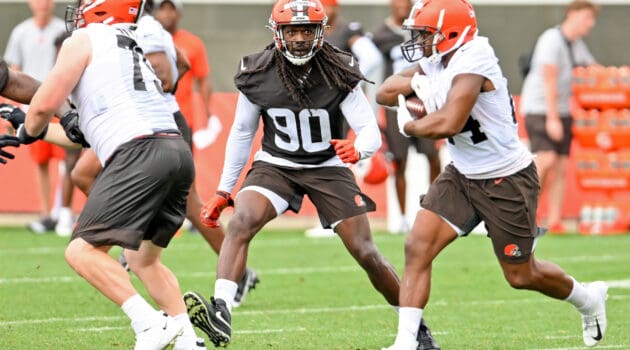 Defensive end Jadeveon Clowney #90 of the Cleveland Browns runs a drill during the second day of Cleveland Browns Training Camp on July 29, 2021 in Berea, Ohio.