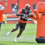 Defensive end Myles Garrett #95 of the Cleveland Browns runs a drill during Cleveland Browns Training Camp on July 30, 2021 in Berea, Ohio.