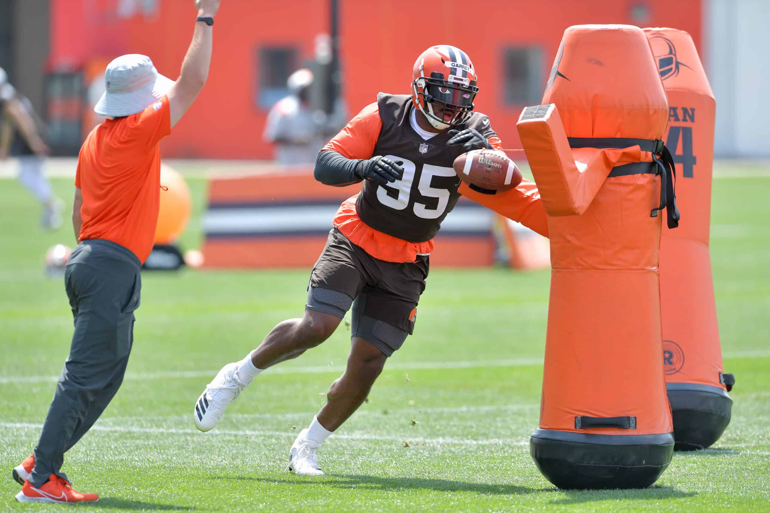 Defensive end Myles Garrett #95 of the Cleveland Browns runs a drill during Cleveland Browns Training Camp on July 30, 2021 in Berea, Ohio.