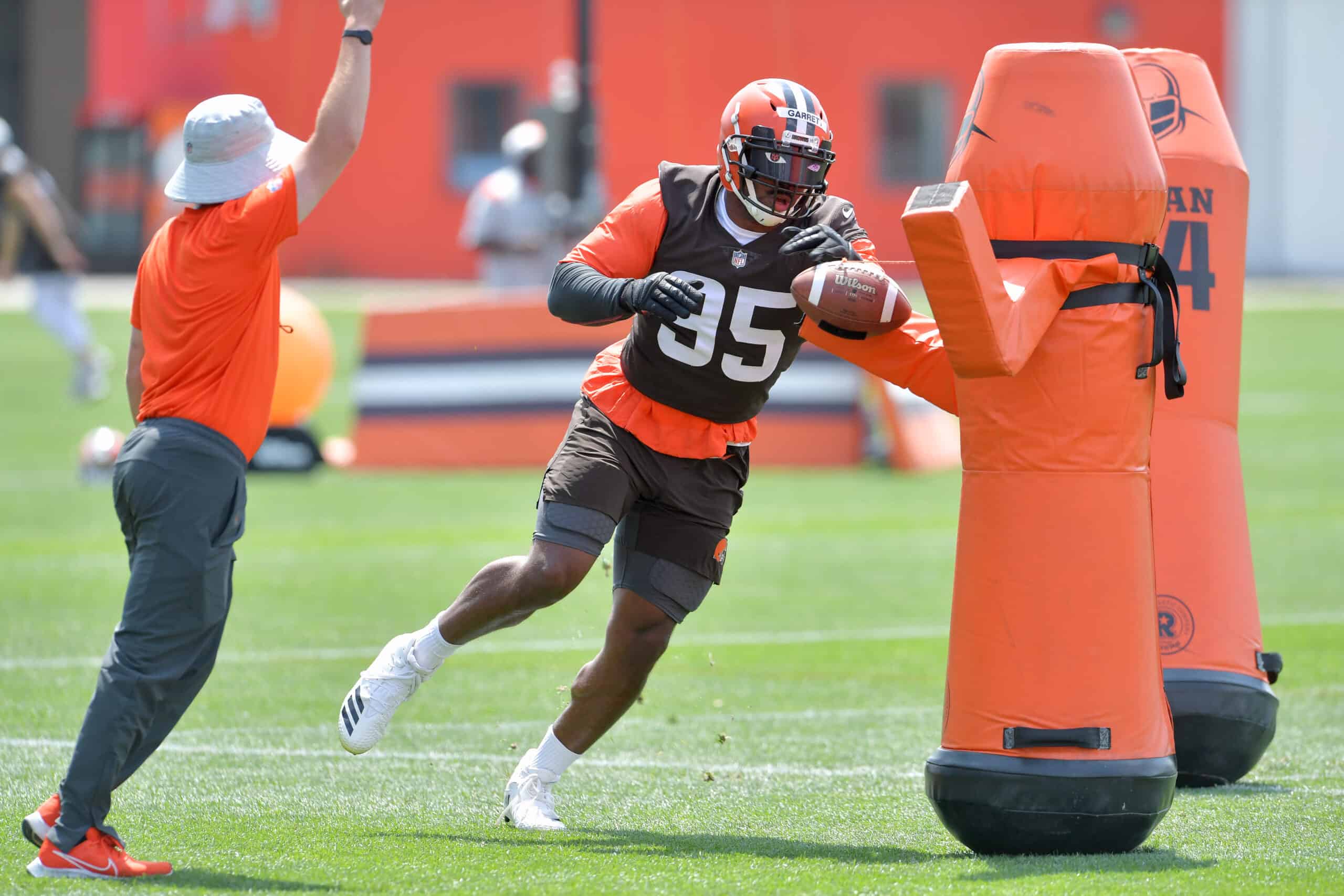 Defensive end Myles Garrett #95 of the Cleveland Browns runs a drill during Cleveland Browns Training Camp on July 30, 2021 in Berea, Ohio. 