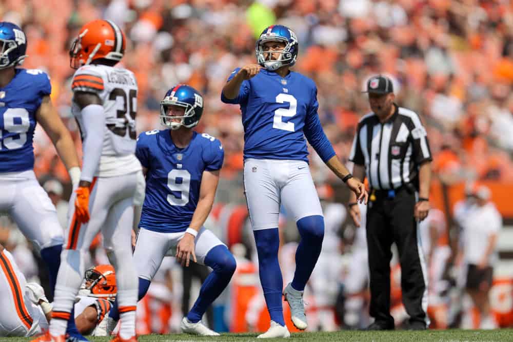 New York Giants kicker Ryan Santoso (2) converts on an extra point out of the hold of New York Giants punter Riley Dixon (9) during the first quarter of the National Football League preseason game between the New York Giants and Cleveland Browns on August 22, 2021, at FirstEnergy Stadium in Cleveland, OH.