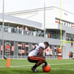 Malcolm Smith #56 of the Cleveland Browns reacts after finishing a drill during a joint practice with the New York Giants on August 19, 2021 in Berea, Ohio.