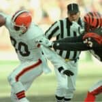 CLEVELAND BROWNS WIDE RECEIVER ANDRE RISON IS DRIVEN OUT OF BOUNDS BY CORNERBACK COREY SAWYER OF THE CINCINNATI BENGALS DURING THE FIRST HALF OF THE BROWNS'' 26-10 VICTORY AT CLEVELAND STADIUM IN CLEVELAND, OHIO.