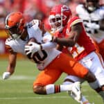 Anthony Schwartz #10 of the Cleveland Browns is tackled by Mike Hughes #21 of the Kansas City Chiefs at Arrowhead Stadium on September 12, 2021 in Kansas City, Missouri.