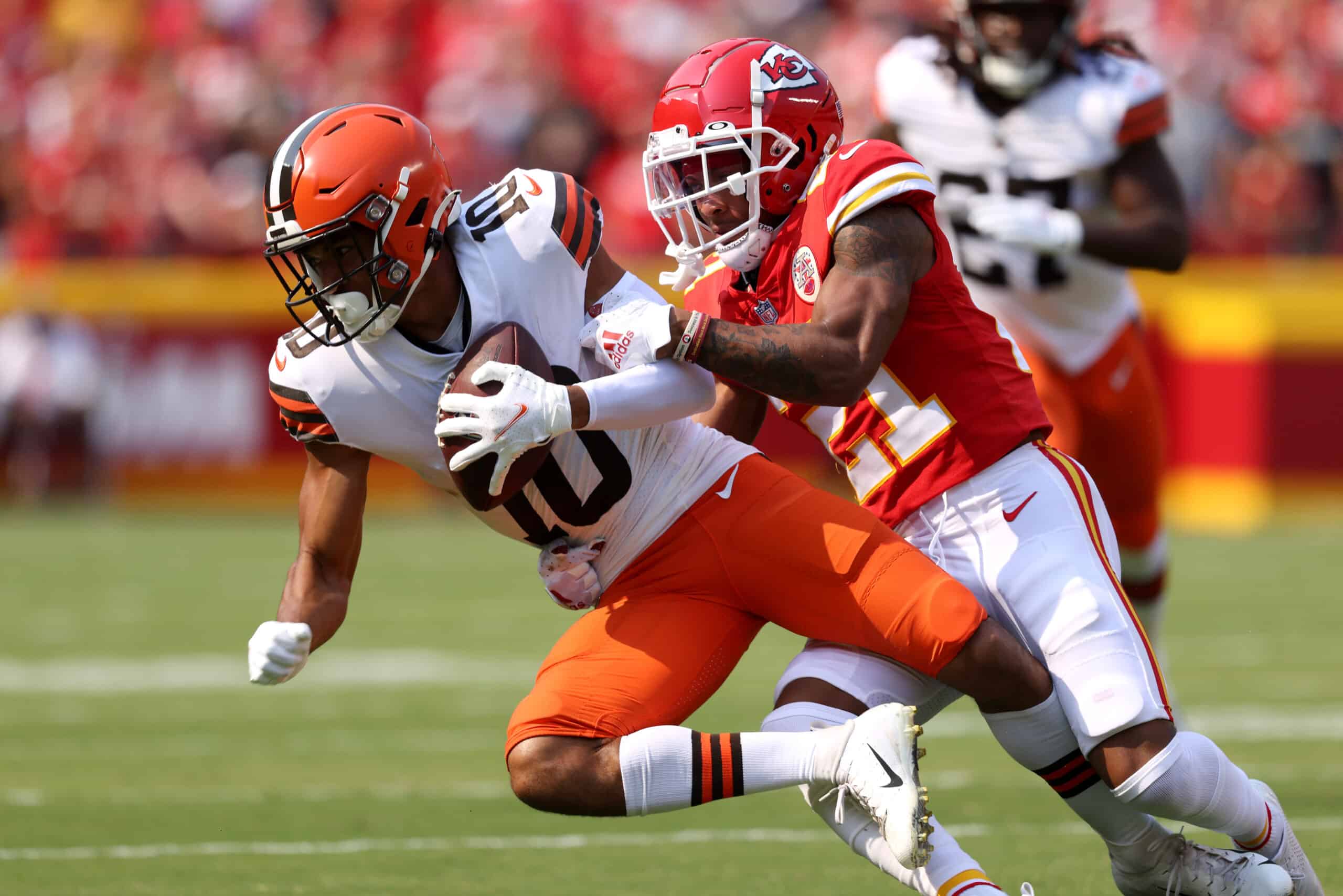 Anthony Schwartz #10 of the Cleveland Browns is tackled by Mike Hughes #21 of the Kansas City Chiefs at Arrowhead Stadium on September 12, 2021 in Kansas City, Missouri.