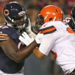 Jordan Mills #67 of the Chicago Bears blocks Xavier Cooper #96 of the Cleveland Browns during a preseason game at Soldier Field on September 3, 2015 in Chicago, Illinois. The Bears defeated the Browns 24-0.