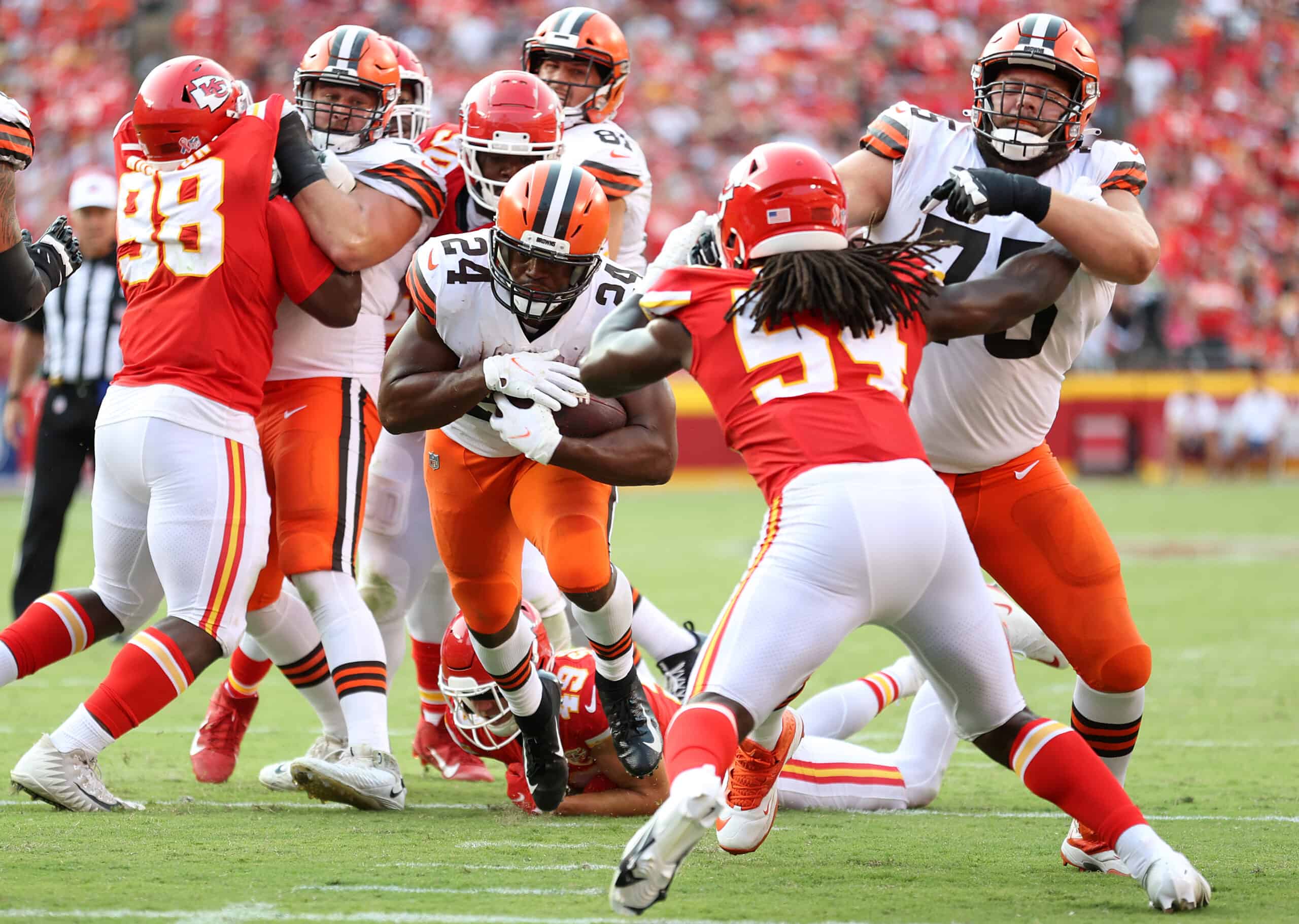 Nick Chubb #24 of the Cleveland Browns runs with the ball against the Kansas City Chiefs during the first half at Arrowhead Stadium on September 12, 2021 in Kansas City, Missouri.