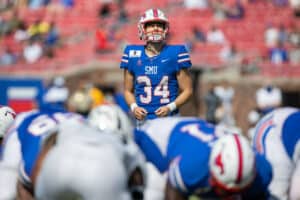 kicker Chris Naggar (#34) prepares to kick an extra point during the college football game between the SMU Mustangs and Memphis Tigers on October 3, 2020, at Gerald J. Ford Stadium in Dallas, TX.