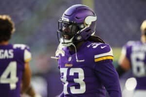 Dalvin Cook #33 of the Minnesota Vikings smiles before the start of a preseason game against the Indianapolis Colts at U.S. Bank Stadium on August 21, 2021 in Minneapolis, Minnesota. The Colts defeated the Vikings 12-10.