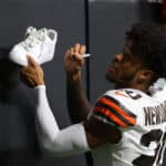 Greg Newsome II #20 of the Cleveland Browns signs autographs after their 19-10 win over the Atlanta Falcons at Mercedes-Benz Stadium on August 29, 2021 in Atlanta, Georgia.