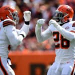 Myles Garrett #95 and Jeremiah Owusu-Koramoah #28 of the Cleveland Browns celebrate after stopping Justin Fields #1 of the Chicago Bears (not picture) during the first half in the game at FirstEnergy Stadium on September 26, 2021 in Cleveland, Ohio.