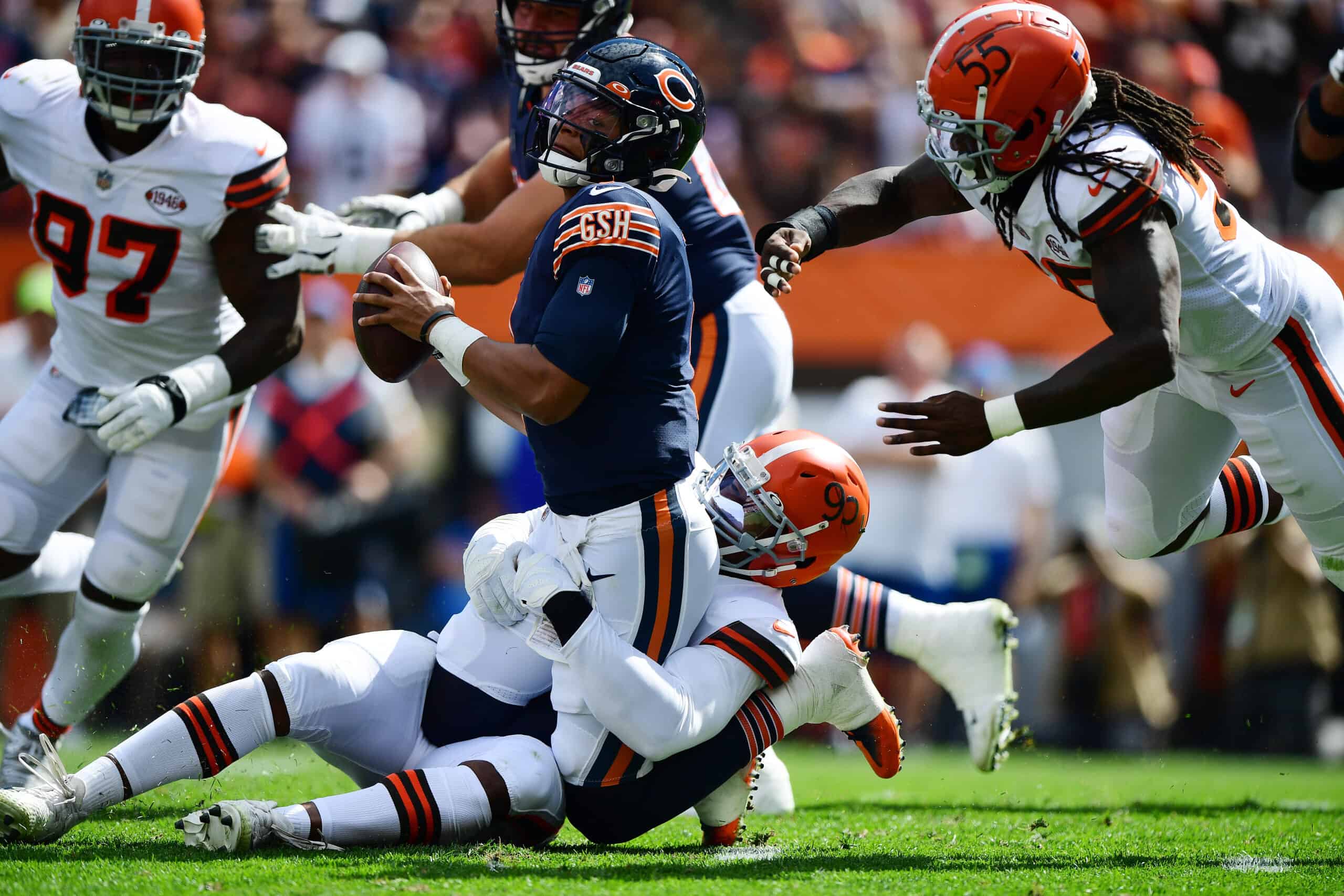 Justin Fields #1 of the Chicago Bears is sacked during the second quarter in the game against the Cleveland Browns at FirstEnergy Stadium on September 26, 2021 in Cleveland, Ohio.