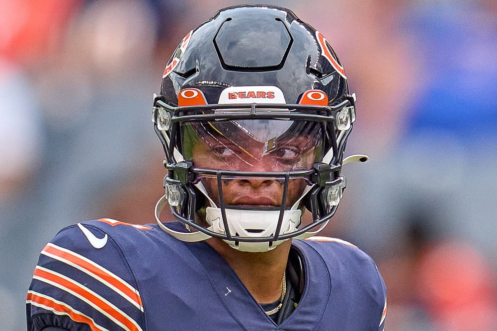 Chicago Bears quarterback Justin Fields (1) looks on during a preseason game between the Chicago Bears and the Buffalo Bills on August 21, 2021 at Soldier Field in Chicago, IL.