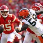 Quarterback Patrick Mahomes #15 of the Kansas City Chiefs scrables as defensive tackle Malik McDowell #58 of the Cleveland Browns defends during the game at Arrowhead Stadium on September 12, 2021 in Kansas City, Missouri.