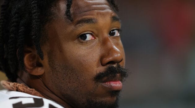 Myles Garrett #95 of the Cleveland Browns looks on against the Atlanta Falcons during the first half at Mercedes-Benz Stadium on August 29, 2021 in Atlanta, Georgia.
