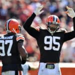 Defensive end Myles Garrett #95 of the Cleveland Browns tries to get the crowd going during the second half in the game against the Houston Texans at FirstEnergy Stadium on September 19, 2021 in Cleveland, Ohio.