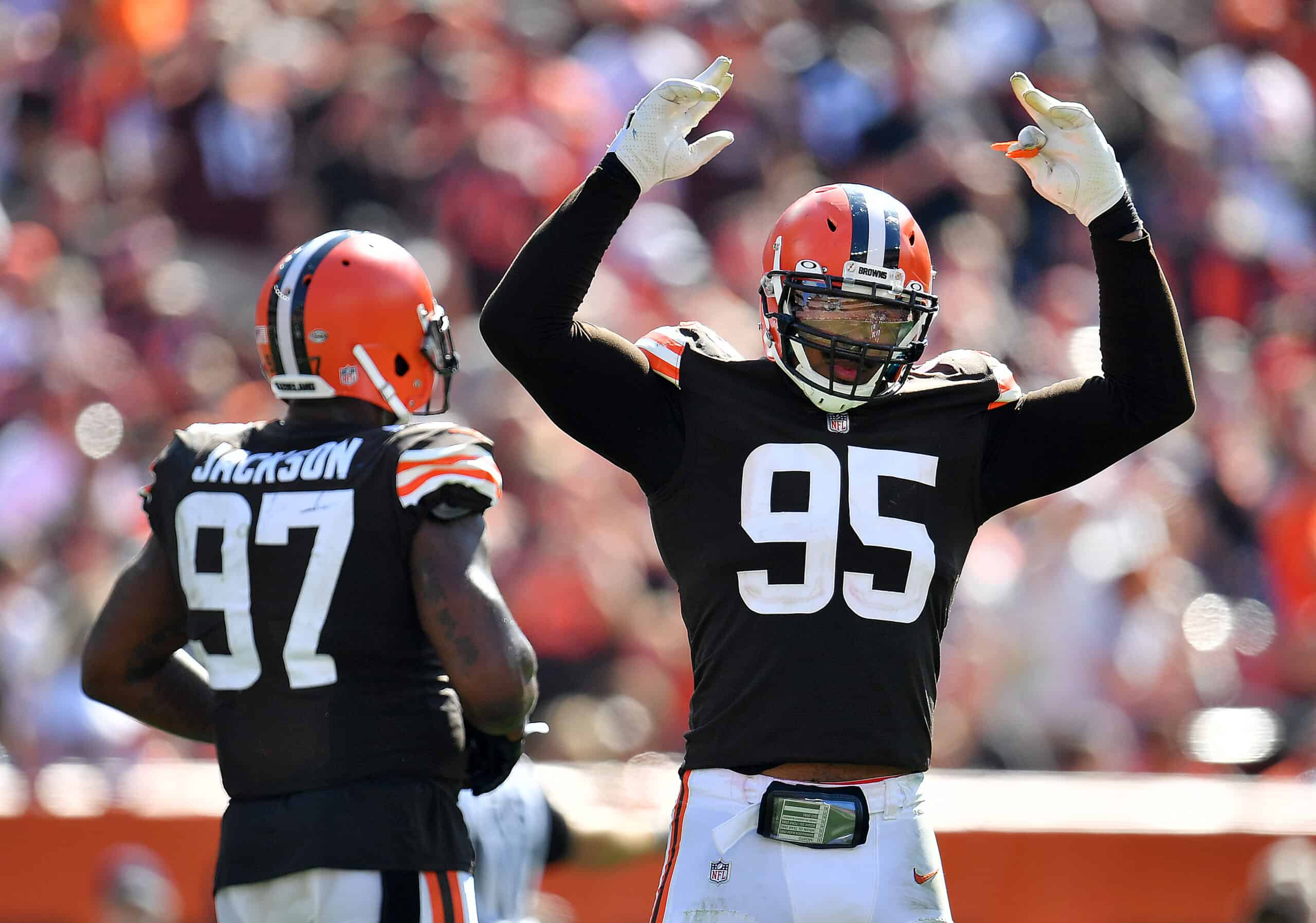 Defensive end Myles Garrett #95 of the Cleveland Browns tries to get the crowd going during the second half in the game against the Houston Texans at FirstEnergy Stadium on September 19, 2021 in Cleveland, Ohio.