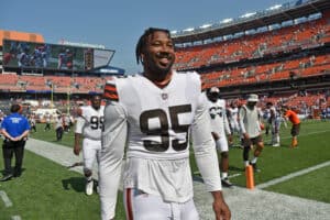 Defensive end Myles Garrett #95 of the Cleveland Browns walks off the field after the Browns defeated the New York Giants at FirstEnergy Stadium on August 22, 2021 in Cleveland, Ohio. The Browns defeated the Giants 17-13.