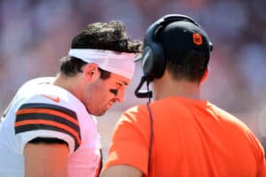 Head coach Kevin Stefanski of the Cleveland Browns talks with Baker Mayfield #6 during the first half in the game against the Chicago Bears at FirstEnergy Stadium on September 26, 2021 in Cleveland, Ohio.