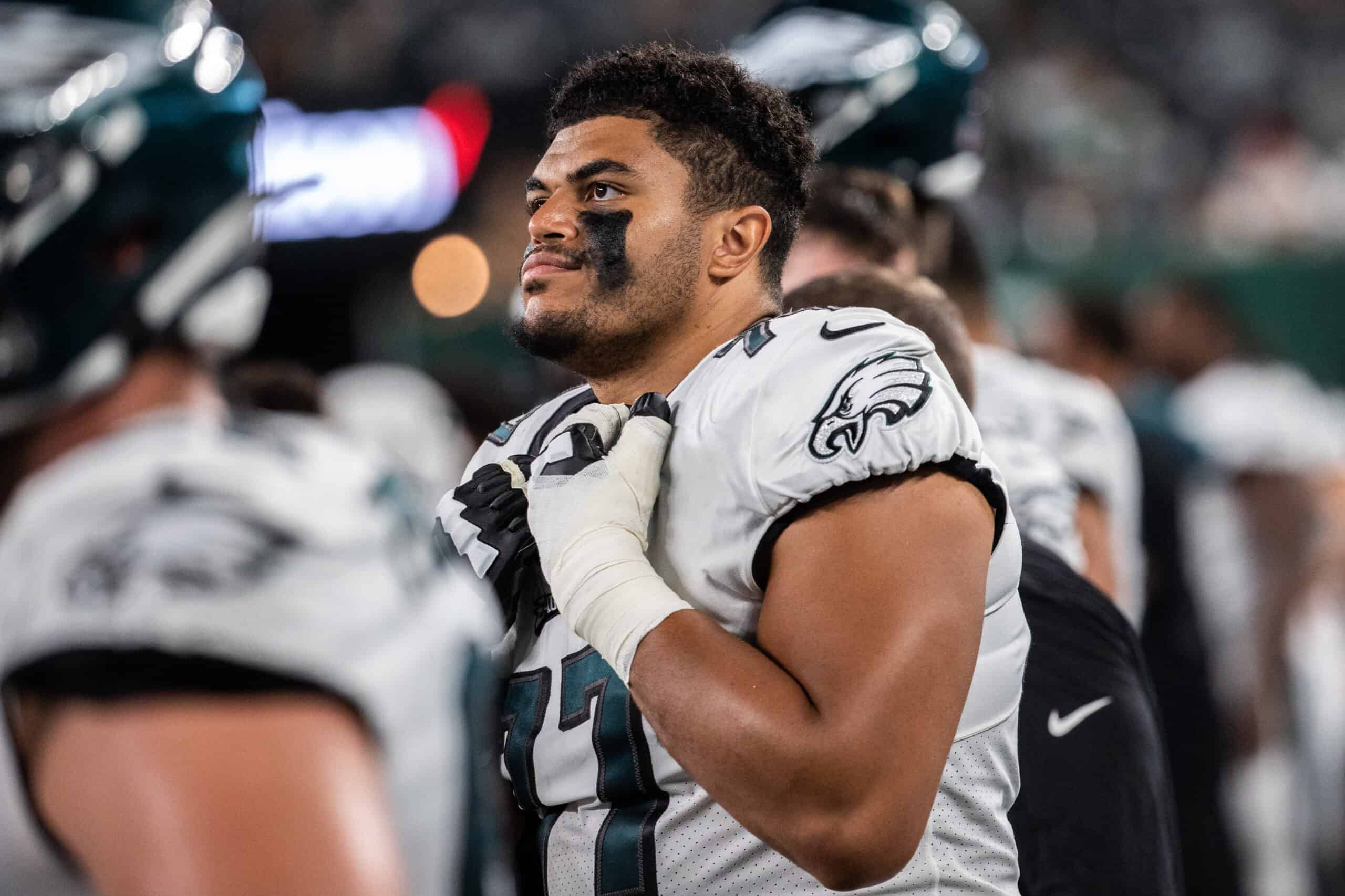 Andre Dillard #77 of the Philadelphia Eagles on the sideline during the fourth quarter of a preseason game against the New York Jets at MetLife Stadium on August 27, 2021 in East Rutherford, New Jersey.