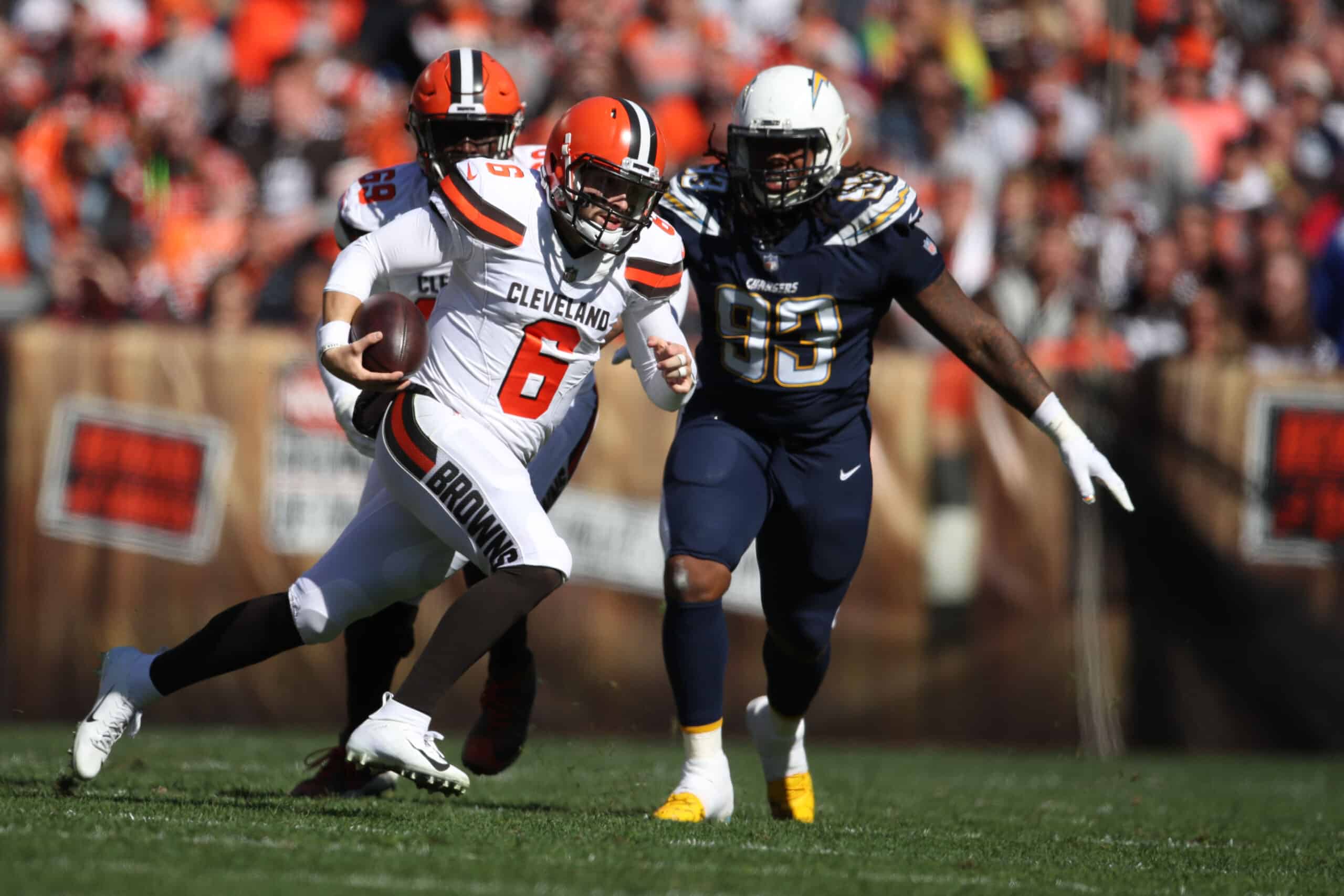 Baker Mayfield #6 of the Cleveland Browns runs the ball in the second quarter against the Los Angeles Chargers at FirstEnergy Stadium on October 14, 2018 in Cleveland, Ohio.