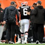Baker Mayfield #6 of the Cleveland Browns is helped off the field by medical personnel after an injury during the third quarter against the Arizona Cardinals at FirstEnergy Stadium on October 17, 2021 in Cleveland, Ohio.