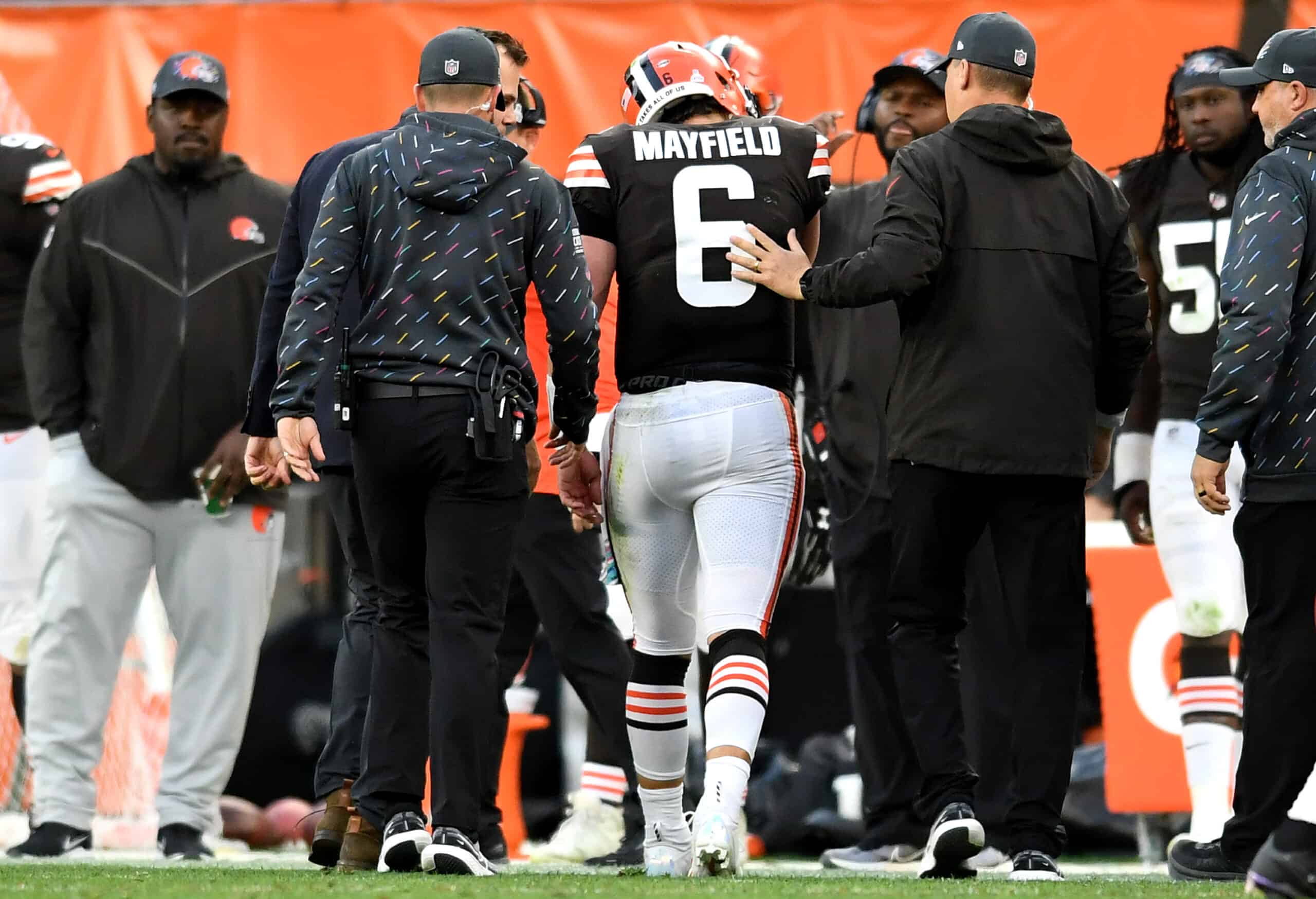 Baker Mayfield #6 of the Cleveland Browns is helped off the field by medical personnel after an injury during the third quarter against the Arizona Cardinals at FirstEnergy Stadium on October 17, 2021 in Cleveland, Ohio. 