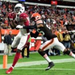 A.J. Green #18 of the Arizona Cardinals catches a touchdown pass under pressure by Greedy Williams #26 of the Cleveland Browns during the fourth quarter at FirstEnergy Stadium on October 17, 2021 in Cleveland, Ohio.