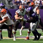Baker Mayfield #6 of the Cleveland Browns is tackled while running the ball by Dalvin Tomlinson #94 of the Minnesota Vikings during the fourth quarter at U.S. Bank Stadium on October 03, 2021 in Minneapolis, Minnesota.