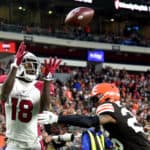 A.J. Green #18 of the Arizona Cardinals catches a touchdown pass under pressure by Greedy Williams #26 of the Cleveland Browns during the fourth quarter at FirstEnergy Stadium on October 17, 2021 in Cleveland, Ohio.
