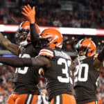 Free safety John Johnson #43 of the Cleveland Browns celebrates with safety Ronnie Harrison #33 after intercepting a Denver Broncos pass in the second quarter at FirstEnergy Stadium on October 21, 2021 in Cleveland, Ohio.
