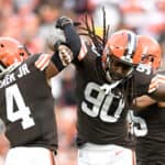 Jadeveon Clowney #90 and Anthony Walker #4 of the Cleveland Browns celebrate a sack by Clowney during the second quarter against the Arizona Cardinals at FirstEnergy Stadium on October 17, 2021 in Cleveland, Ohio.