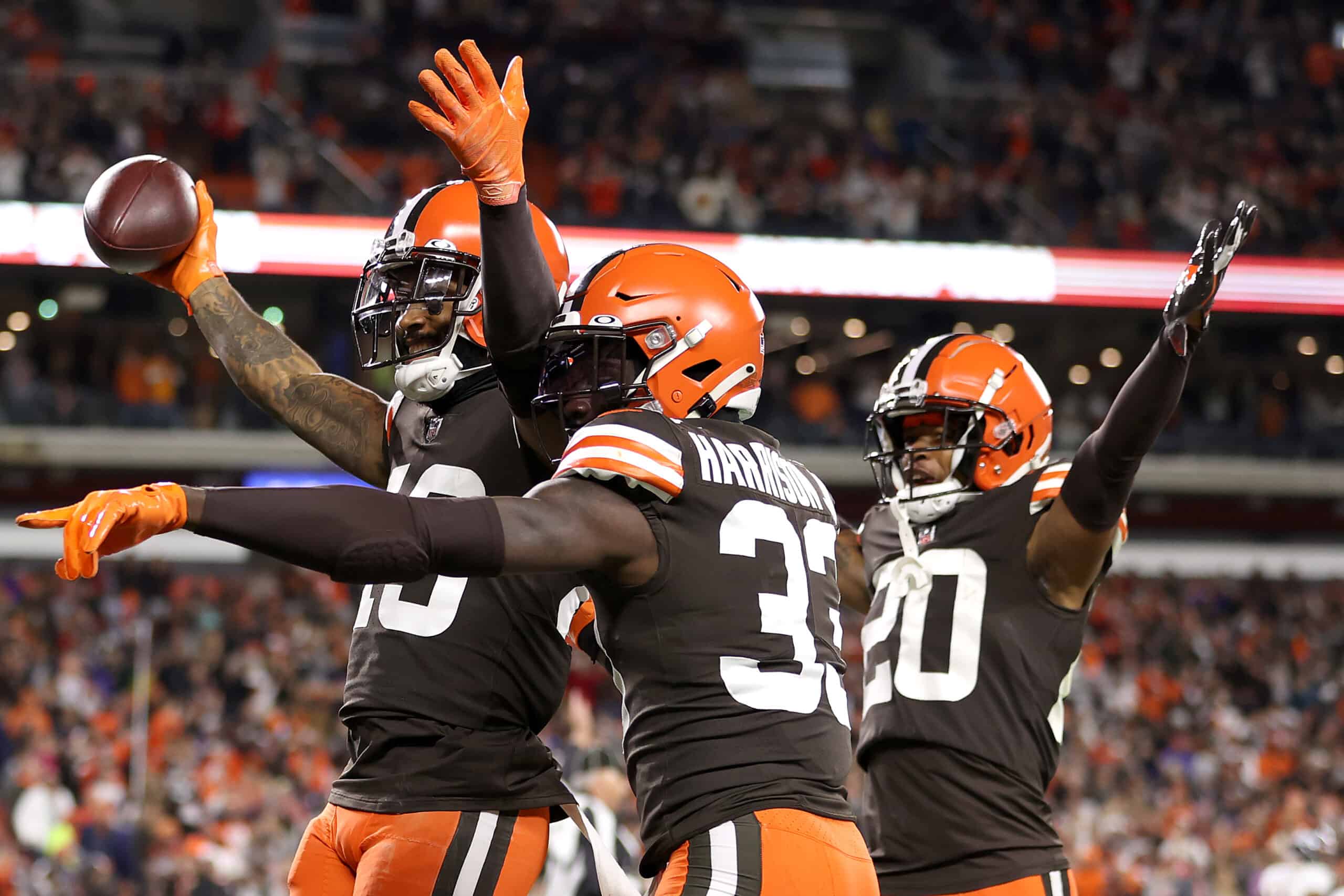 Free safety John Johnson #43 of the Cleveland Browns celebrates with safety Ronnie Harrison #33 after intercepting a Denver Broncos pass in the second quarter at FirstEnergy Stadium on October 21, 2021 in Cleveland, Ohio. 