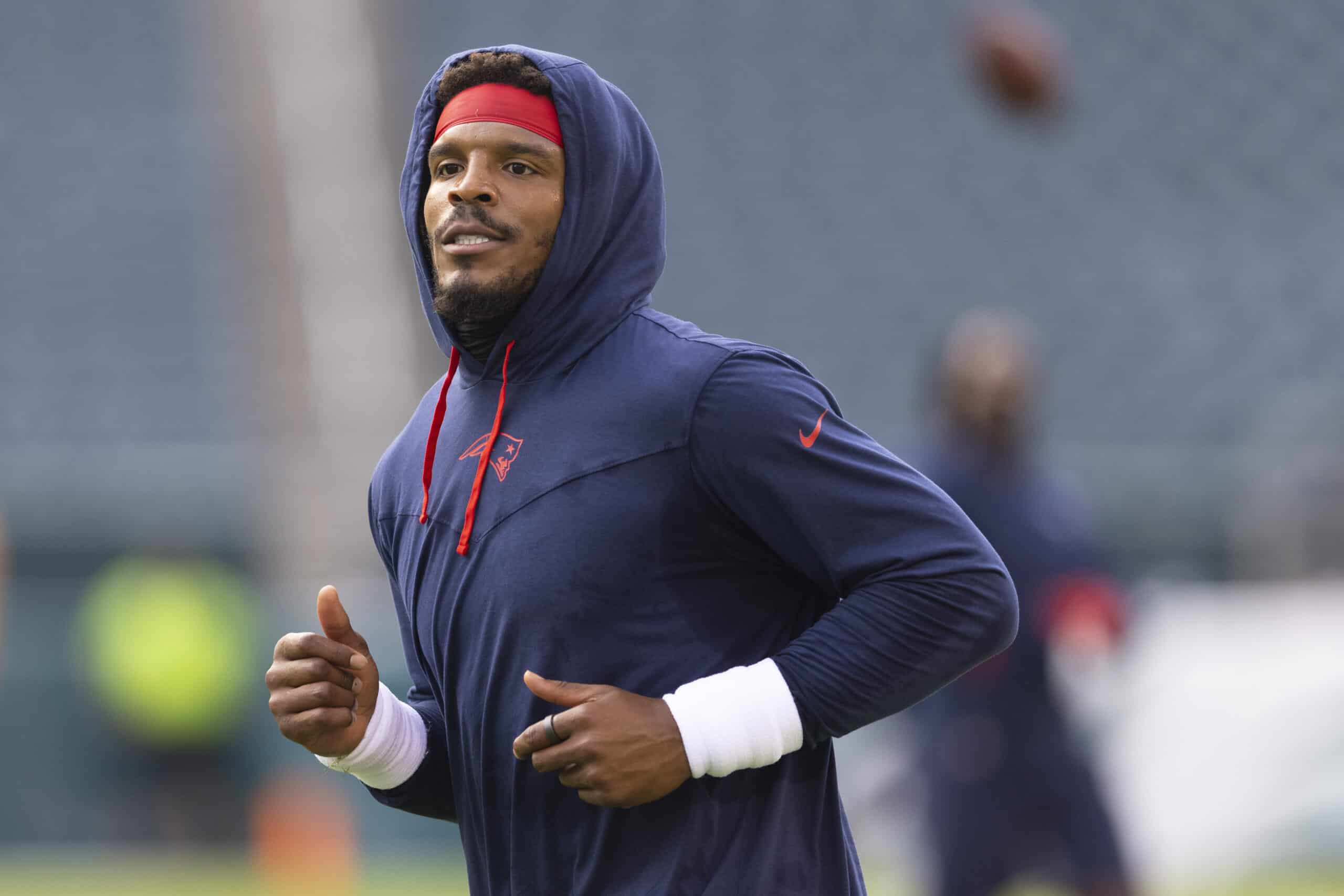 Cam Newton #1 of the New England Patriots looks on prior to the preseason game against the Philadelphia Eagles at Lincoln Financial Field on August 19, 2021 in Philadelphia, Pennsylvania