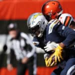 Tyrell Williams #16 of the Los Angeles Chargers makes a touchdown catch defended by Denzel Ward #21 of the Cleveland Browns in the second quarter at FirstEnergy Stadium on October 14, 2018 in Cleveland, Ohio.