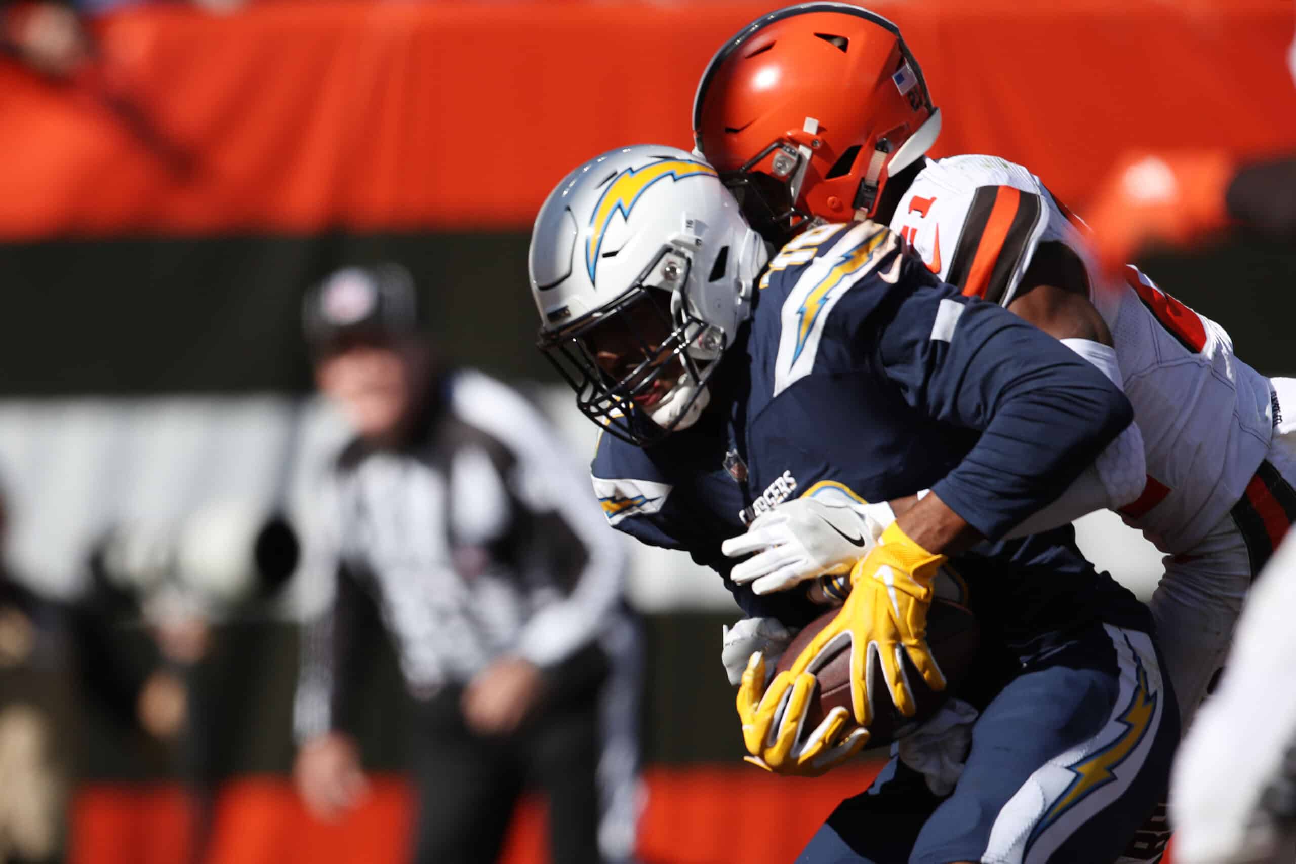 Tyrell Williams #16 of the Los Angeles Chargers makes a touchdown catch defended by Denzel Ward #21 of the Cleveland Browns in the second quarter at FirstEnergy Stadium on October 14, 2018 in Cleveland, Ohio. 