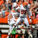 Cleveland Browns defensive end Myles Garrett (95) and Cleveland Browns linebacker Jeremiah Owusu-Koramoah (28) celebrate after sacking Chicago Bears quarterback Justin Fields (1) (not pictured) during the second quarter of the National Football League game between the Chicago Bears and Cleveland Browns on September 26, 2021, at FirstEnergy Stadium in Cleveland, OH.