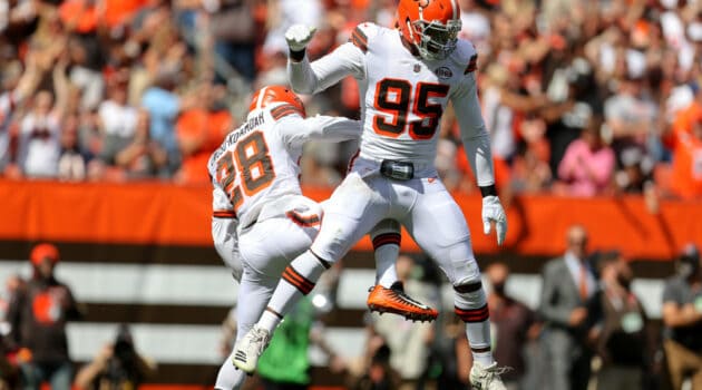 Cleveland Browns defensive end Myles Garrett (95) and Cleveland Browns linebacker Jeremiah Owusu-Koramoah (28) celebrate after sacking Chicago Bears quarterback Justin Fields (1) (not pictured) during the second quarter of the National Football League game between the Chicago Bears and Cleveland Browns on September 26, 2021, at FirstEnergy Stadium in Cleveland, OH.