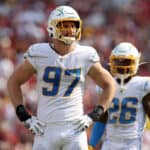 Joey Bosa #97 of the Los Angeles Chargers looks on during the second half against the Washington Football Team at FedExField on September 12, 2021 in Landover, Maryland.