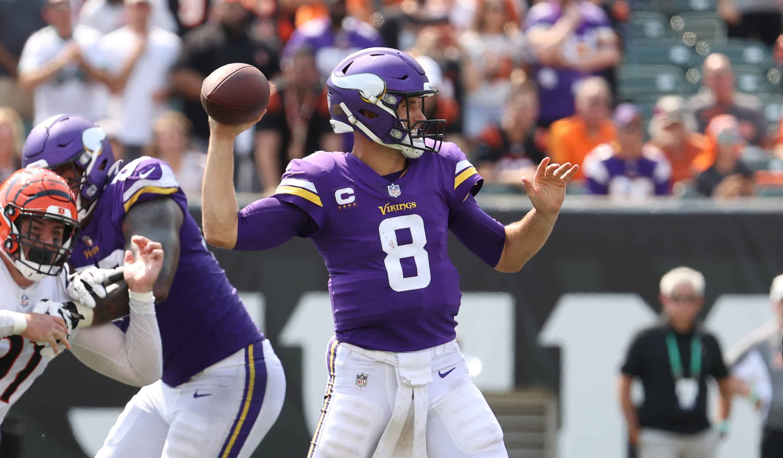 Kirk Cousins #8 of the Minnesota Vikings throws a pass against the Cincinnati Bengals at Paul Brown Stadium on September 12, 2021 in Cincinnati, Ohio. 