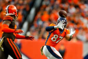 Tight end Noah Fant #87 of the Denver Broncos catches a pass in front of linebacker Mack Wilson #51 of the Cleveland Browns during the third quarter at Empower Field at Mile High on November 3, 2019 in Denver, Colorado. The Broncos defeated the Browns 24-19.